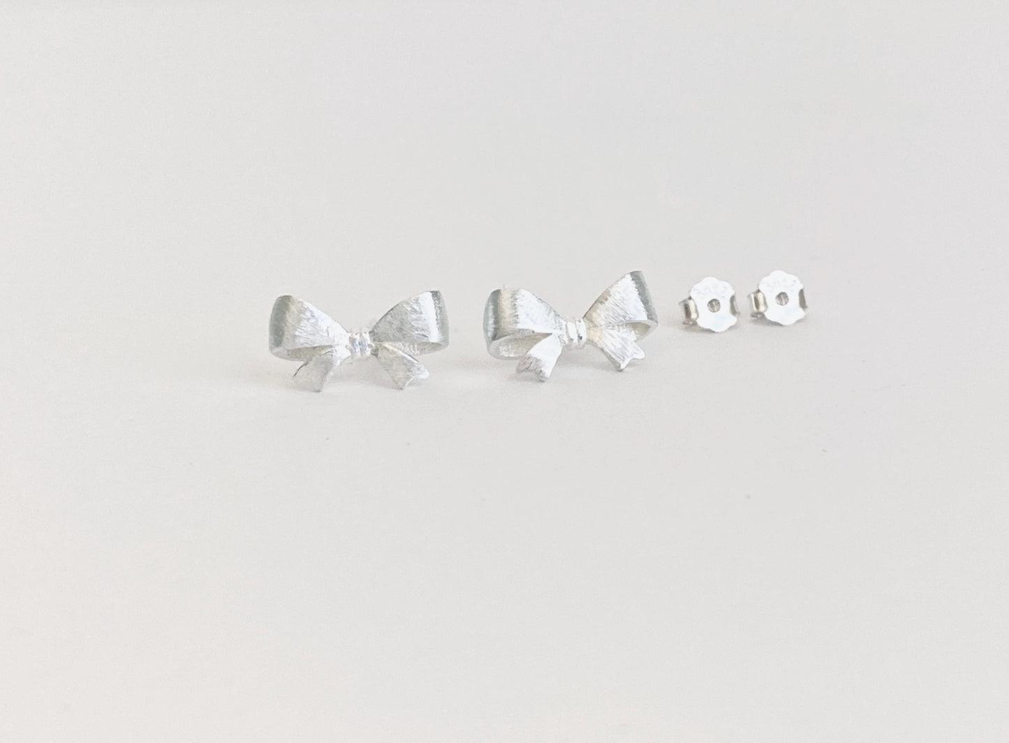 Sterling Silver “Tie the Knot” Stud Earrings • Minimalist Love Knot Earrings