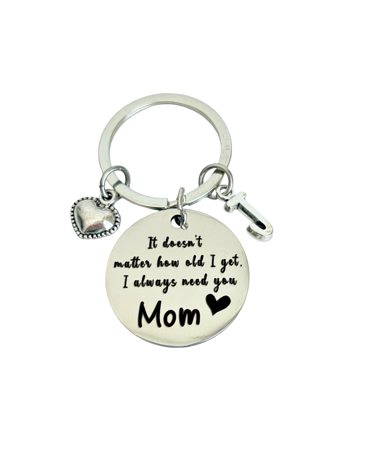 Keychain with sentimental message 'It doesn't matter how old I get, I always need you Mom' on a white background