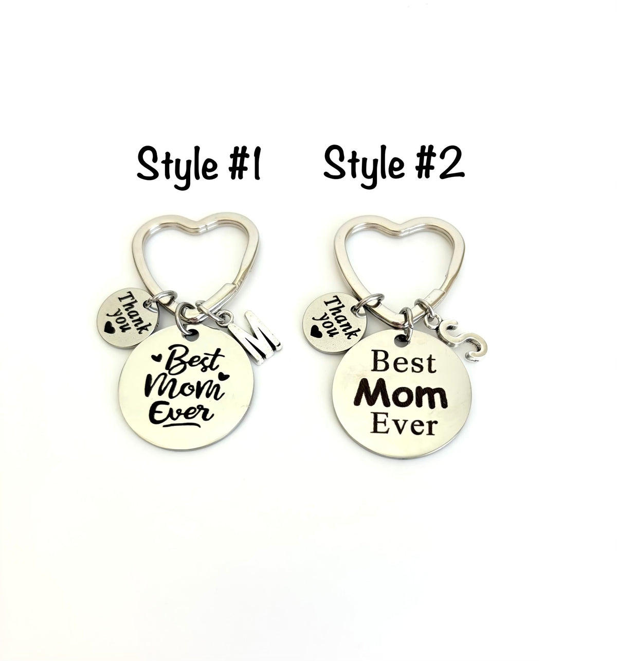 Two 'Best Mom Ever' keychains with heart and I love you charms on a white background.