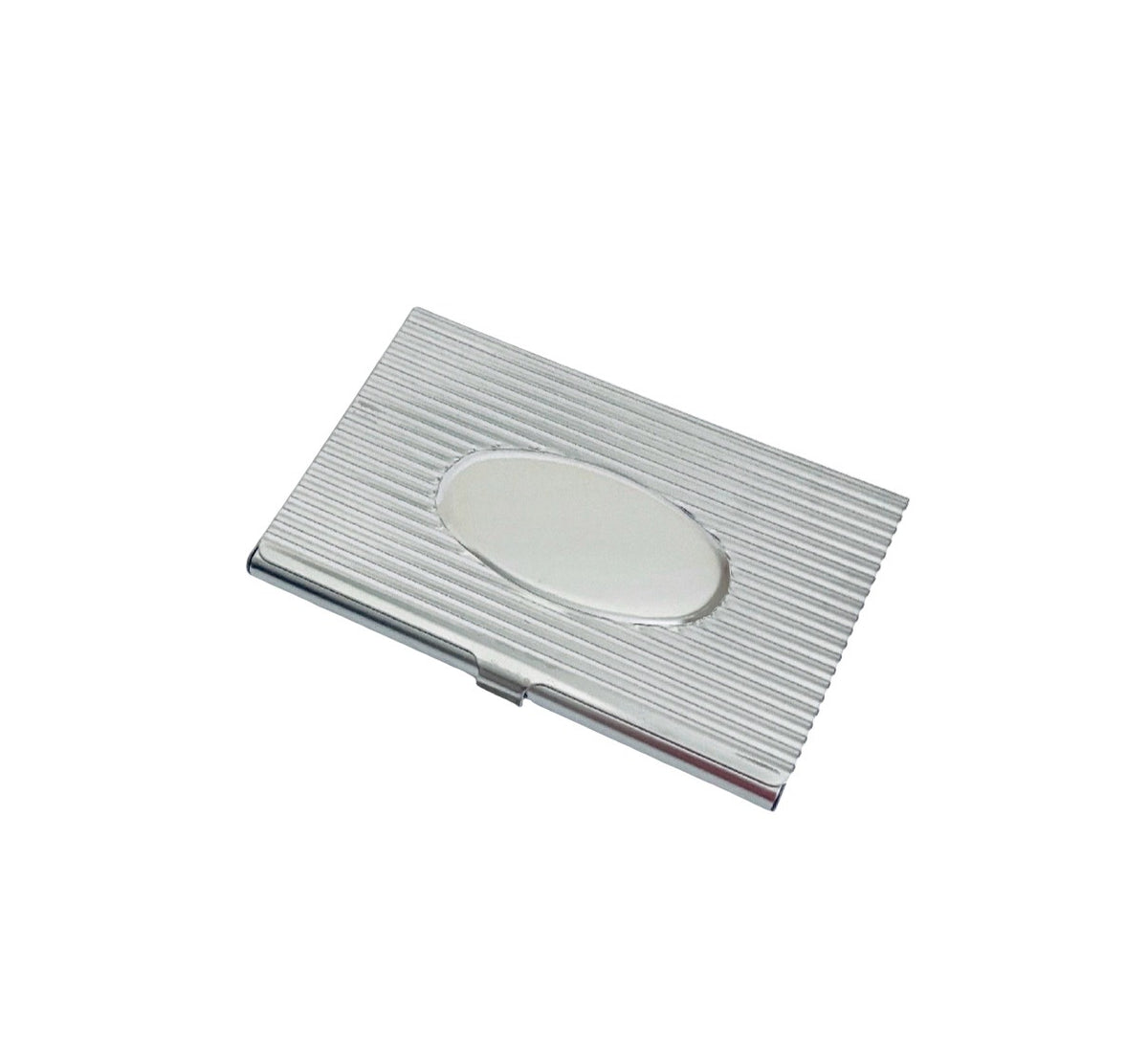 A silver aluminum business card case with a ribbed texture and a central oval cutout, shown on a plain white background.