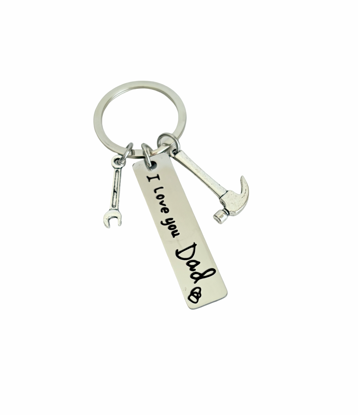 Keychain with 'I Love You Dad' tag and hammer charm on a white background