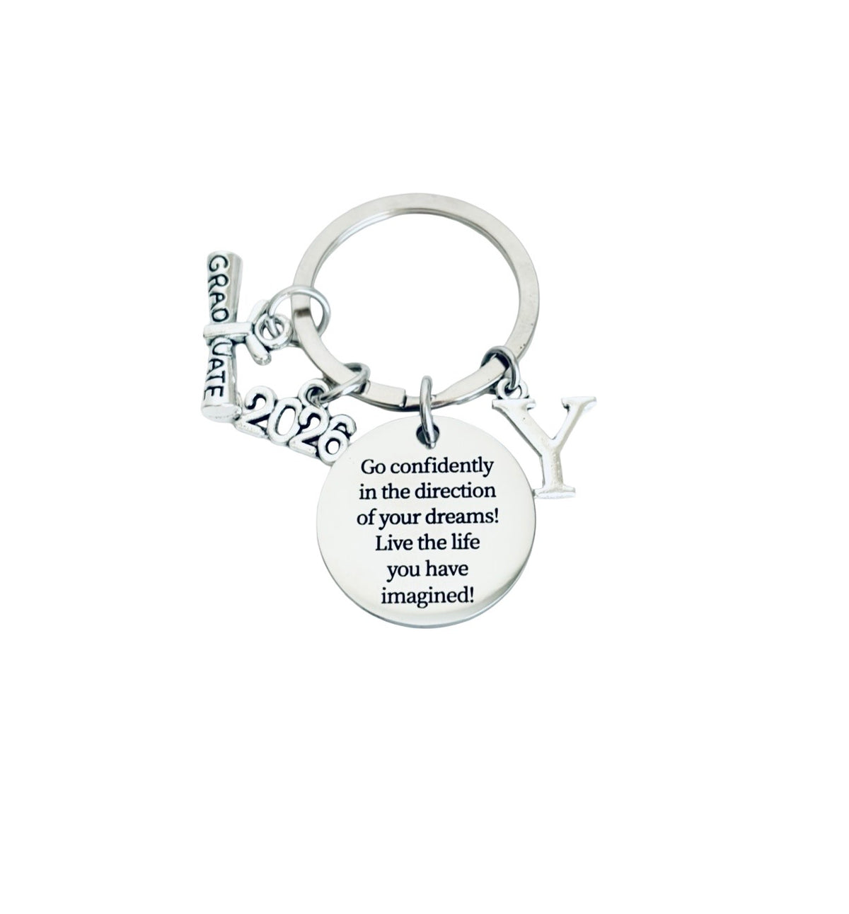 Silver keychain with motivational quote on a white background