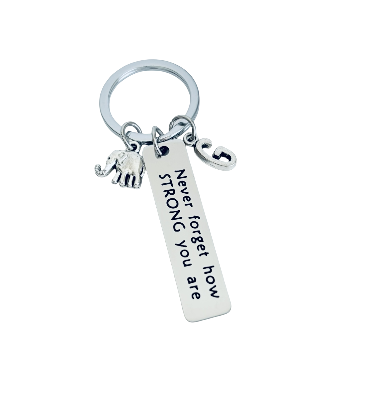 Silver keychain with motivational tag and elephant charm on a white background