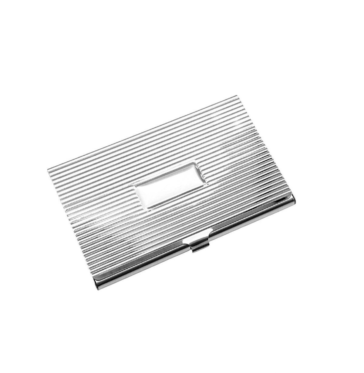 A silver metallic business card case with a textured, horizontally ribbed exterior and a central rectangular cutout, shown on a plain white background.