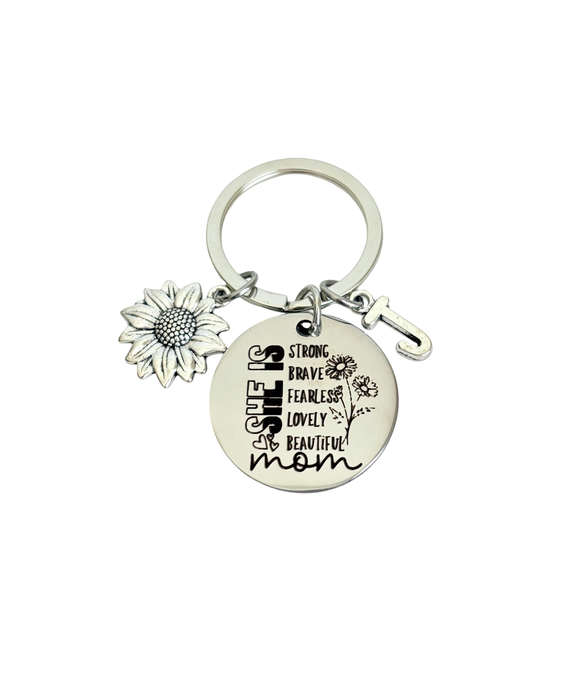Keychain with sunflower charm and engraved text on a white background