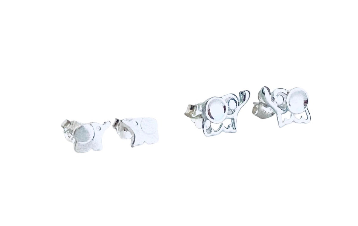 A pair of silver stud earrings shaped like small elephants facing each other, shown from both front and back angles on a plain white background.
