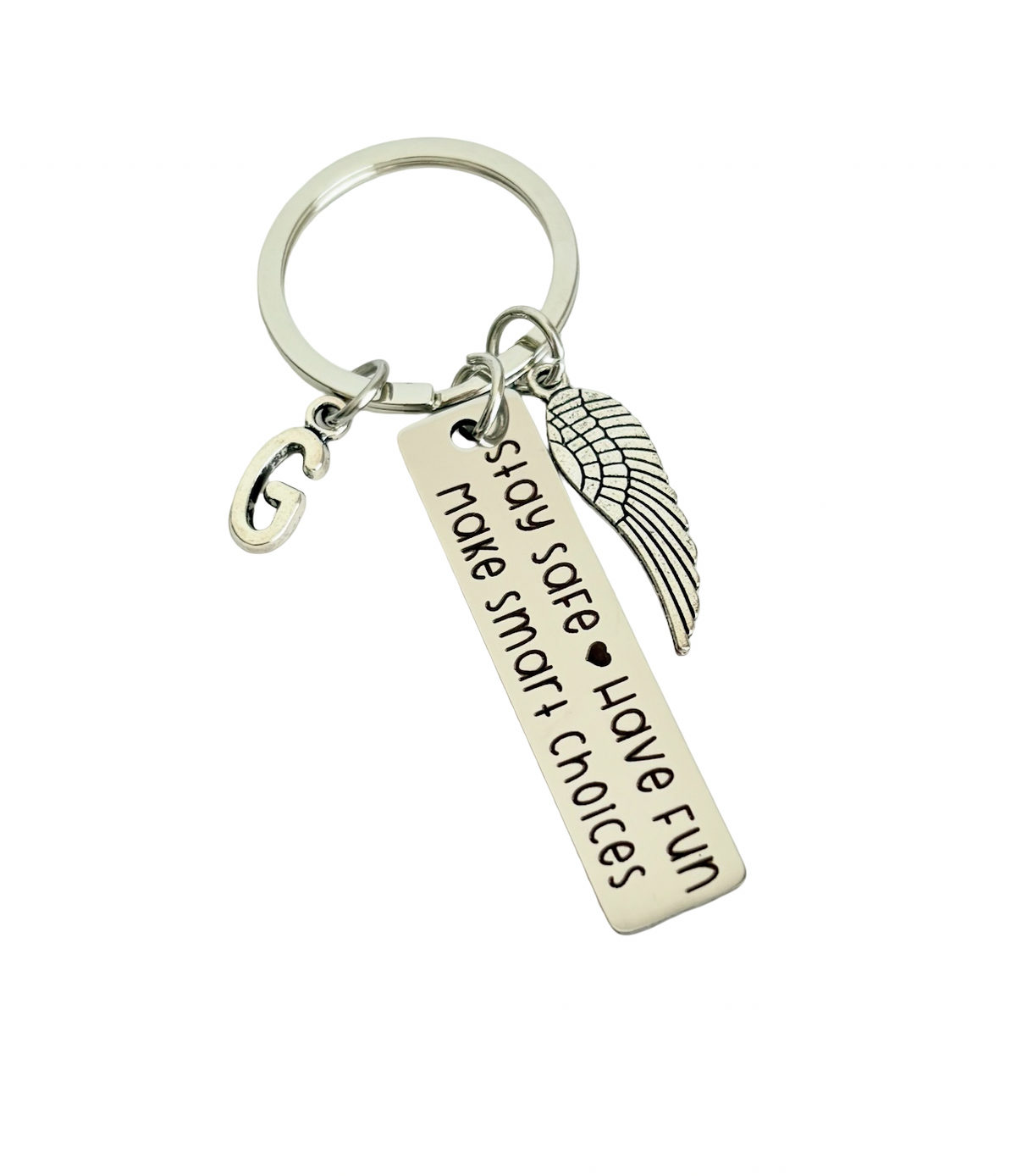 Keychain with motivational message and wing charm on a white background