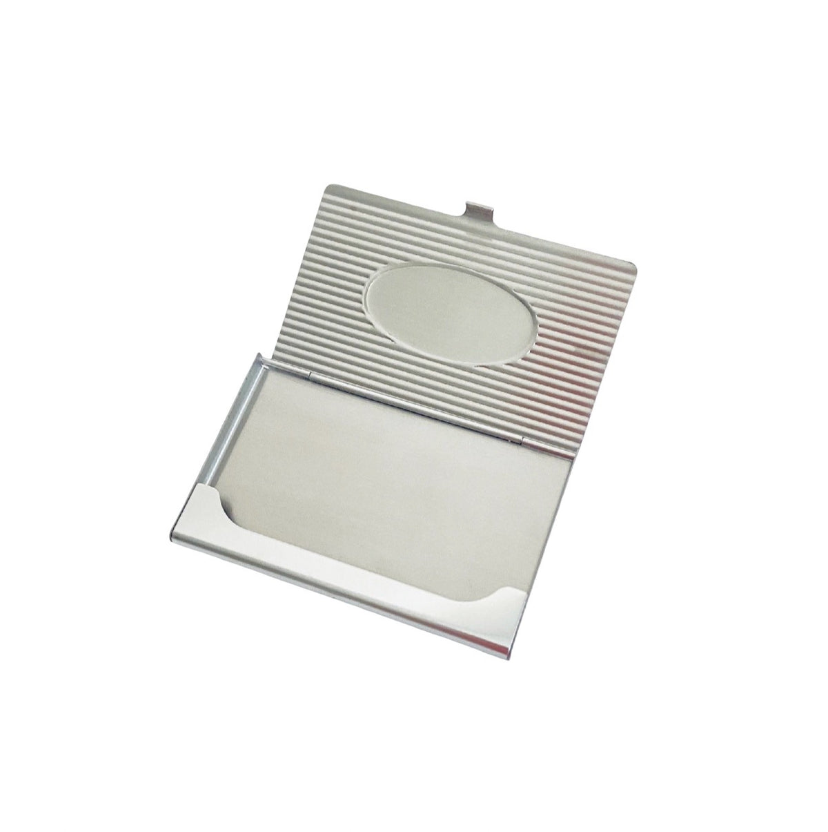 A silver metallic compact case, shown open to reveal a textured ribbed lid with an oval mirror reflection and a card slot interior, set against a plain white background.